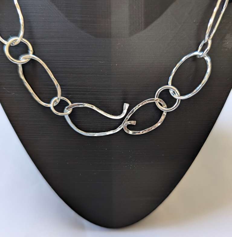 silver necklace open clasp